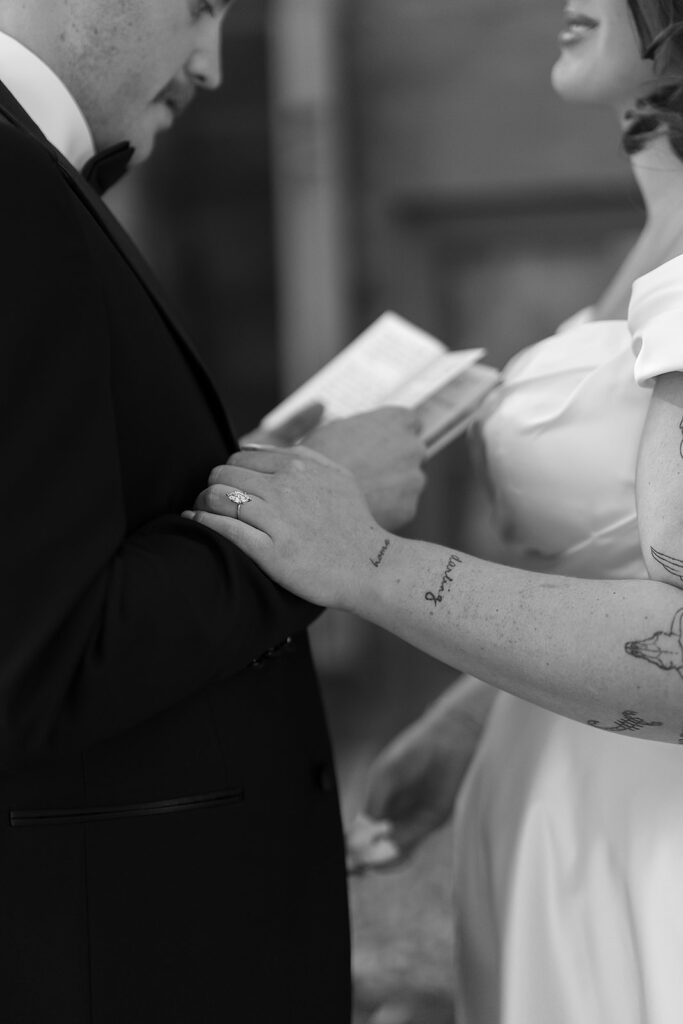 bride and groom exchanging private vows during their minnesota courthouse wedding