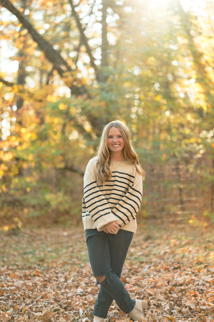 fall minnesota senior photoshoot in a forest in bemidji