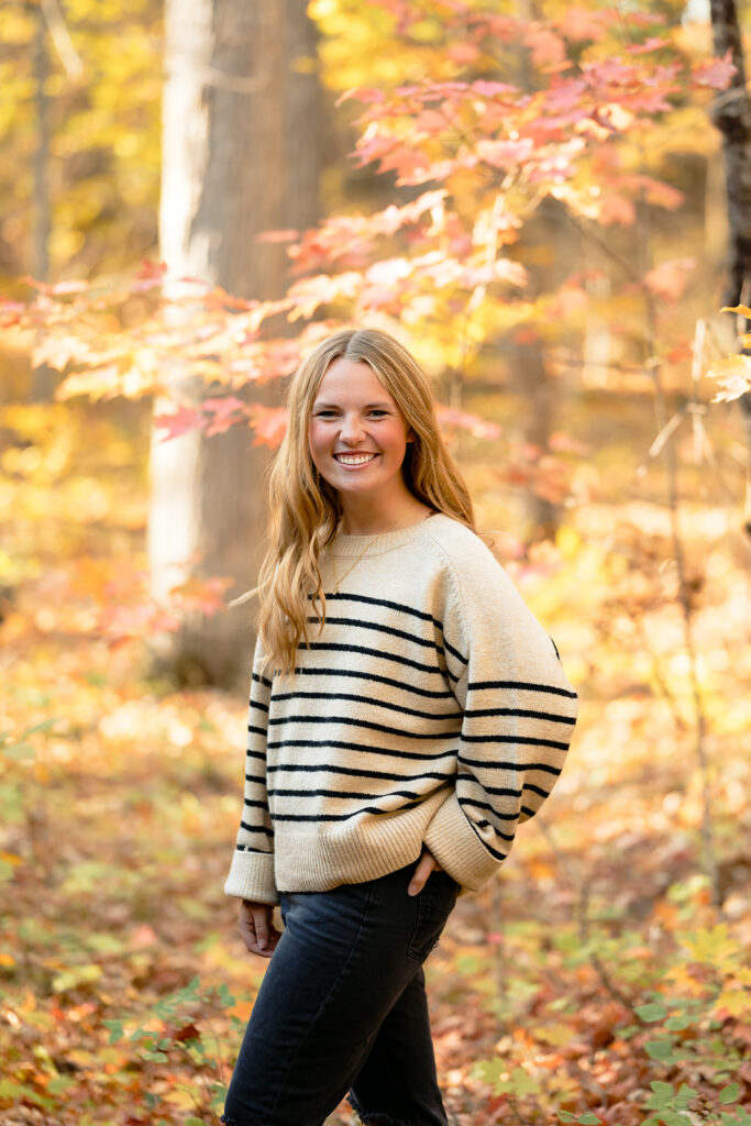 fall minnesota senior photoshoot in a forest in bemidji
