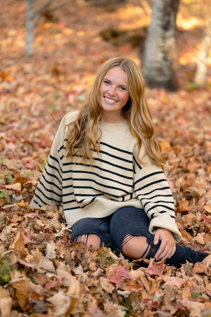 fall minnesota senior photoshoot in a forest in bemidji