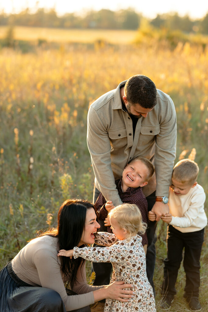 sweet and playful fall family photography in a field in bemidji mn