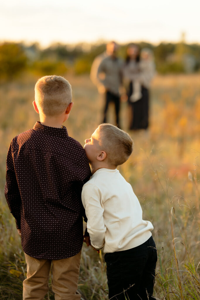 sweet and playful fall family photography in a field in bemidji mn