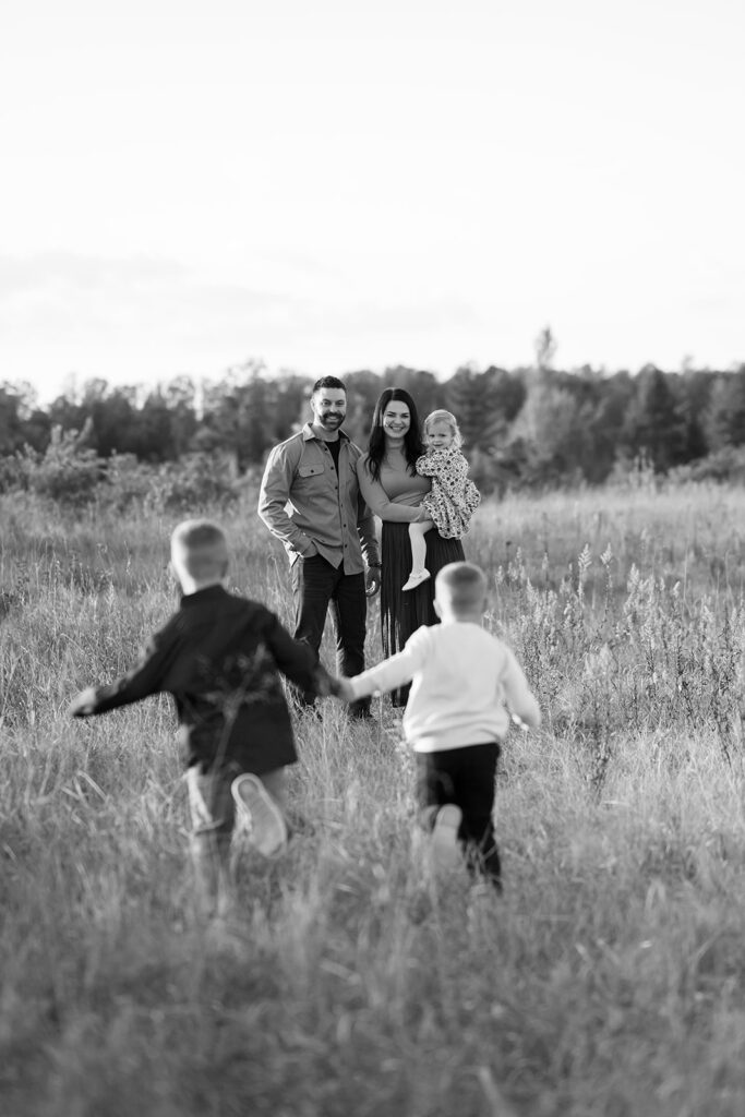 sweet and playful fall family photography in a field in bemidji mn