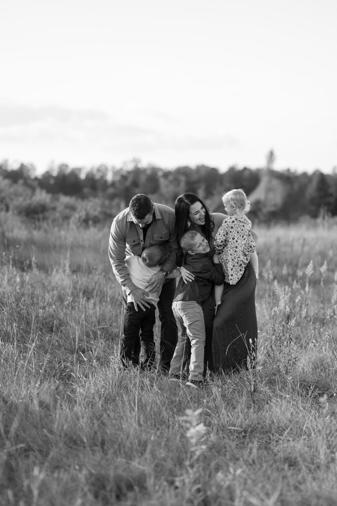 sweet and playful fall family photography in a field in bemidji mn