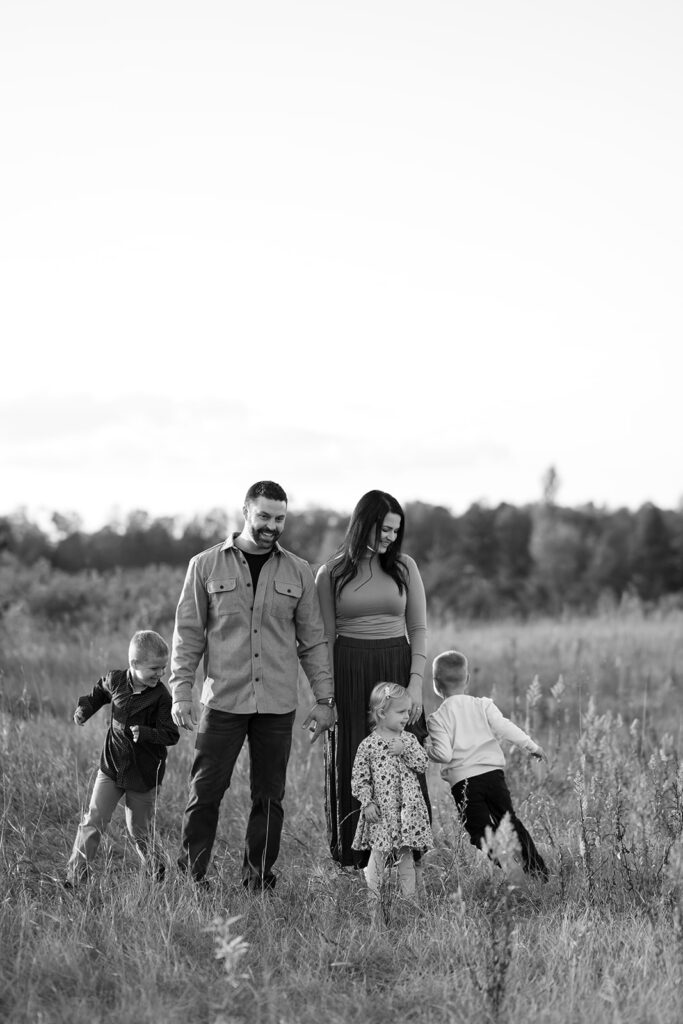 sweet and playful fall family photography in a field in bemidji mn