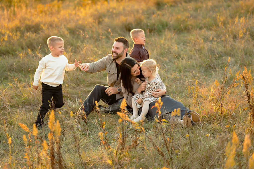 sweet and playful fall family photography in a field in bemidji mn
