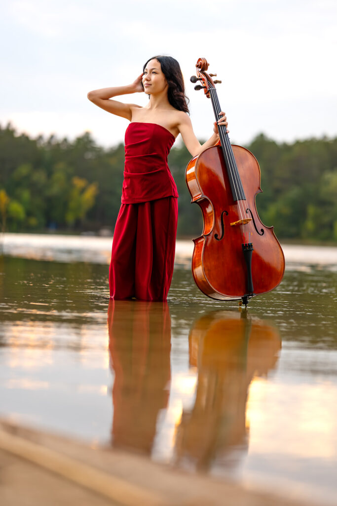 elegant senior photos with a chello in a lake