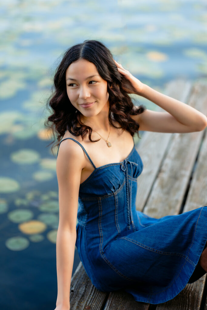 fall senior photos on a lake dock in western minnesota
