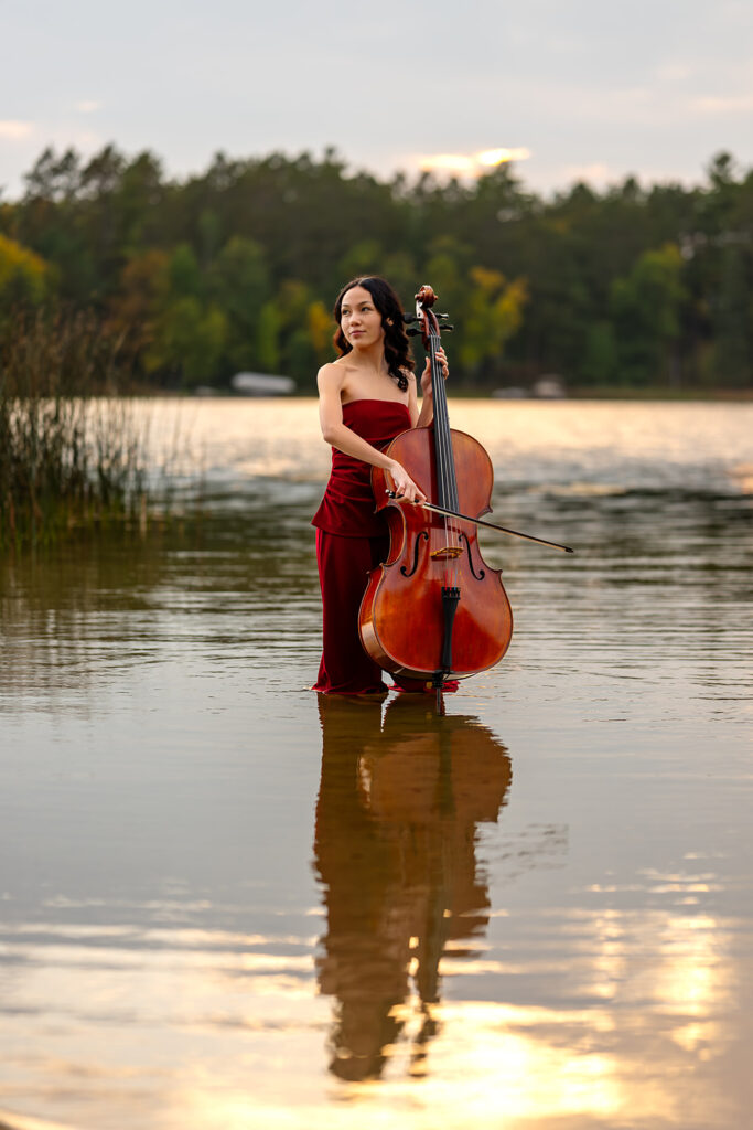 elegant senior photos with a chello in a lake