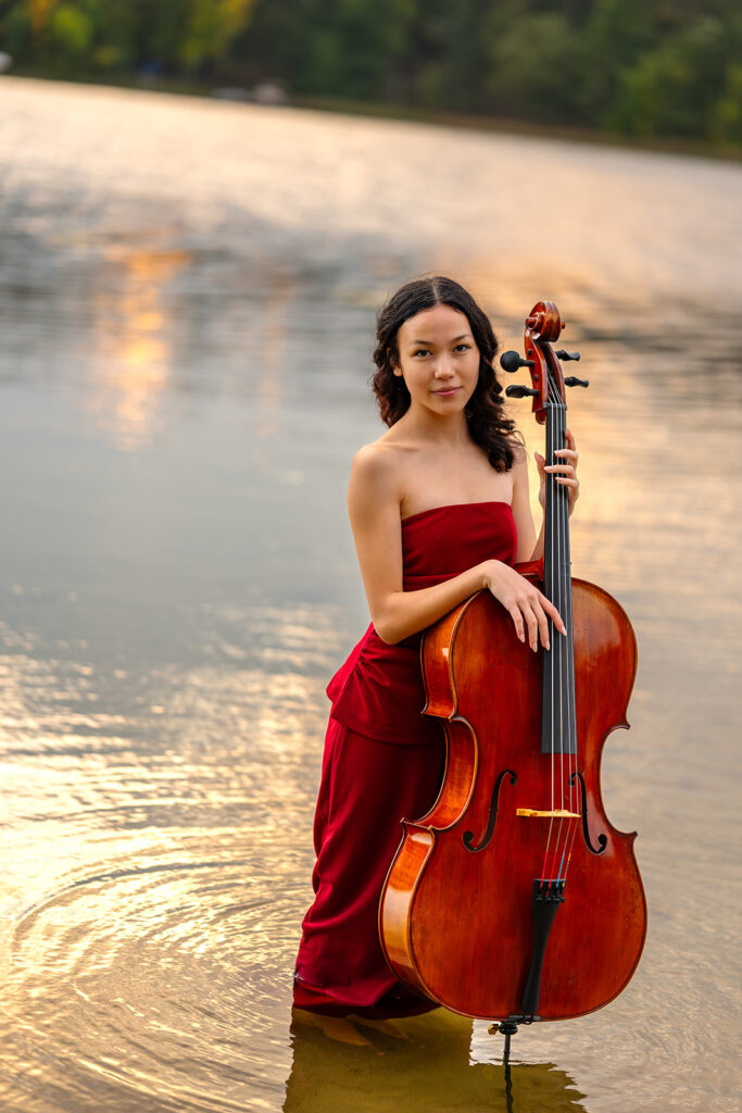 elegant senior photos with a chello in a lake