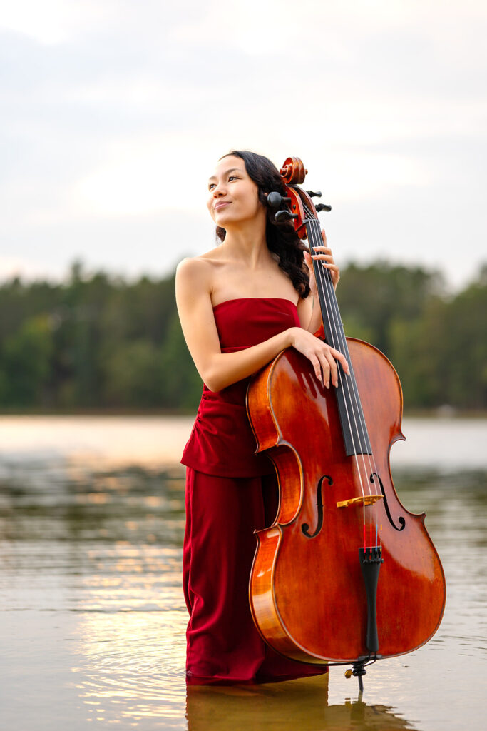 elegant senior photos with a chello in a lake