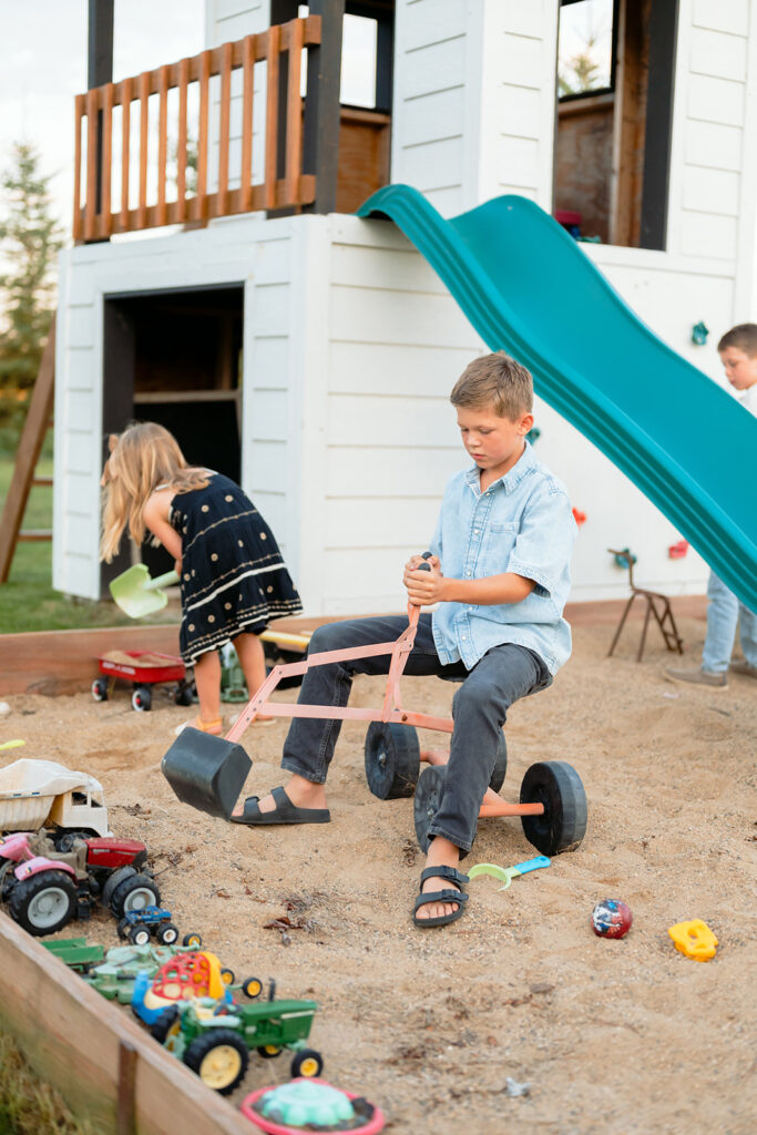 kids playing in a sandbox