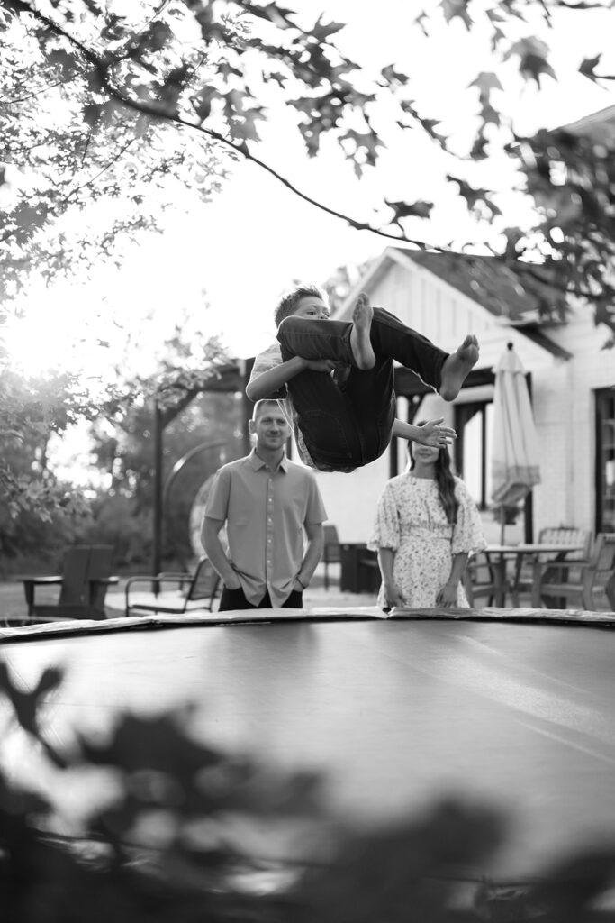 kids playing in their backyard as we capture sweet family photos at home