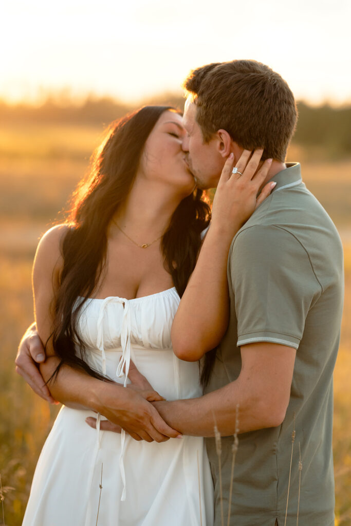 golden hour romantic engagement photos in a field in bemidji mn