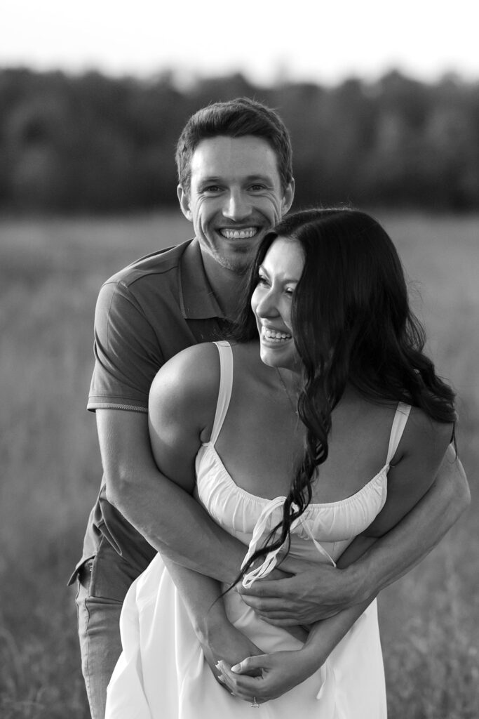 romantic field engagement moments in black and white
