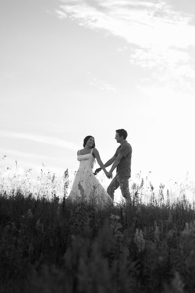 golden hour romantic engagement photos in a field in bemidji mn