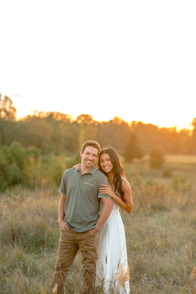 golden hour romantic engagement photos in a field in bemidji mn