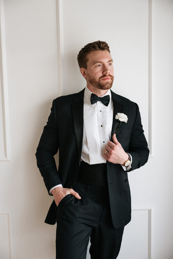 luxury indoor groom portraits with timeless editorial style in Bemidji MN