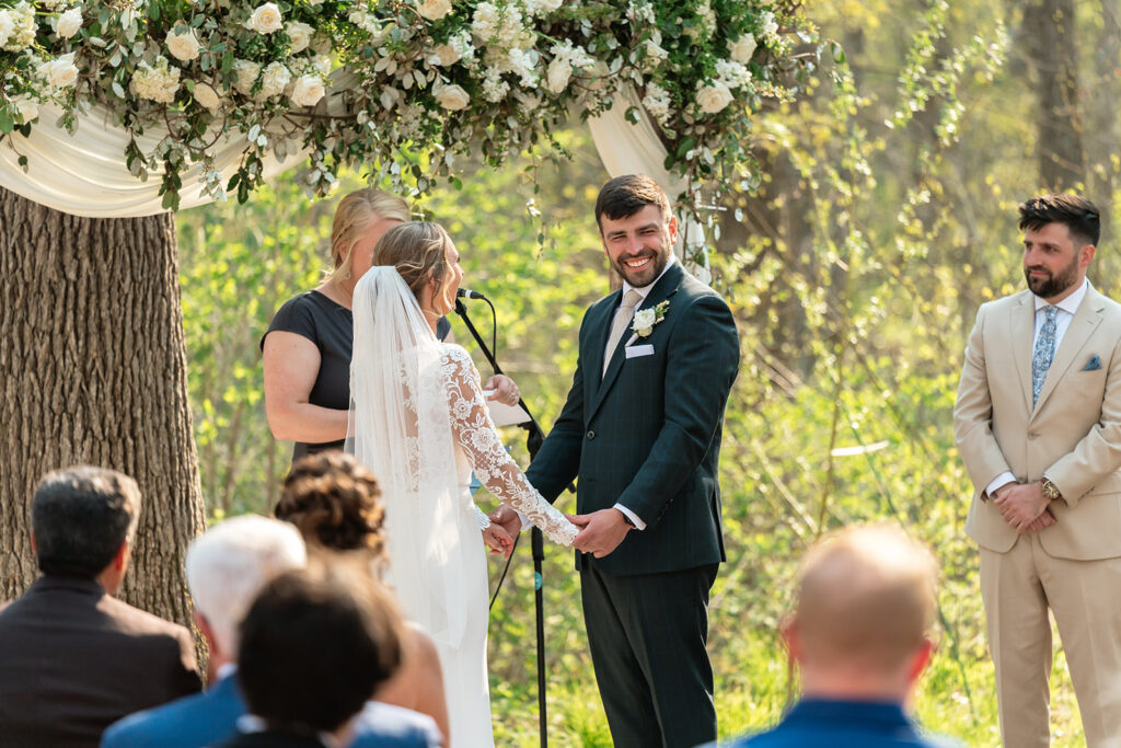 candid wedding ceremony moments at the atrium in solon springs ,wi