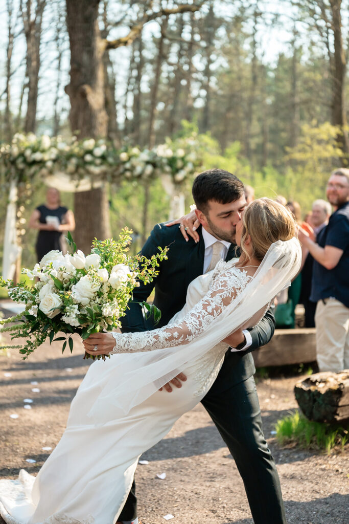 candid wedding ceremony moments at the atrium in solon springs ,wi
