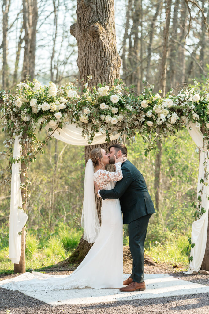 candid wedding ceremony moments at the atrium in solon springs ,wi