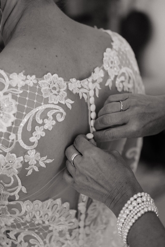 bride getting ready with mom