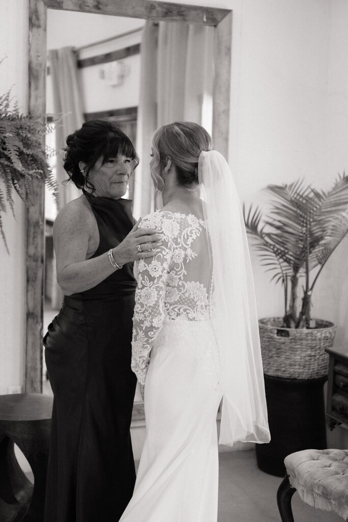 bride getting ready with mom