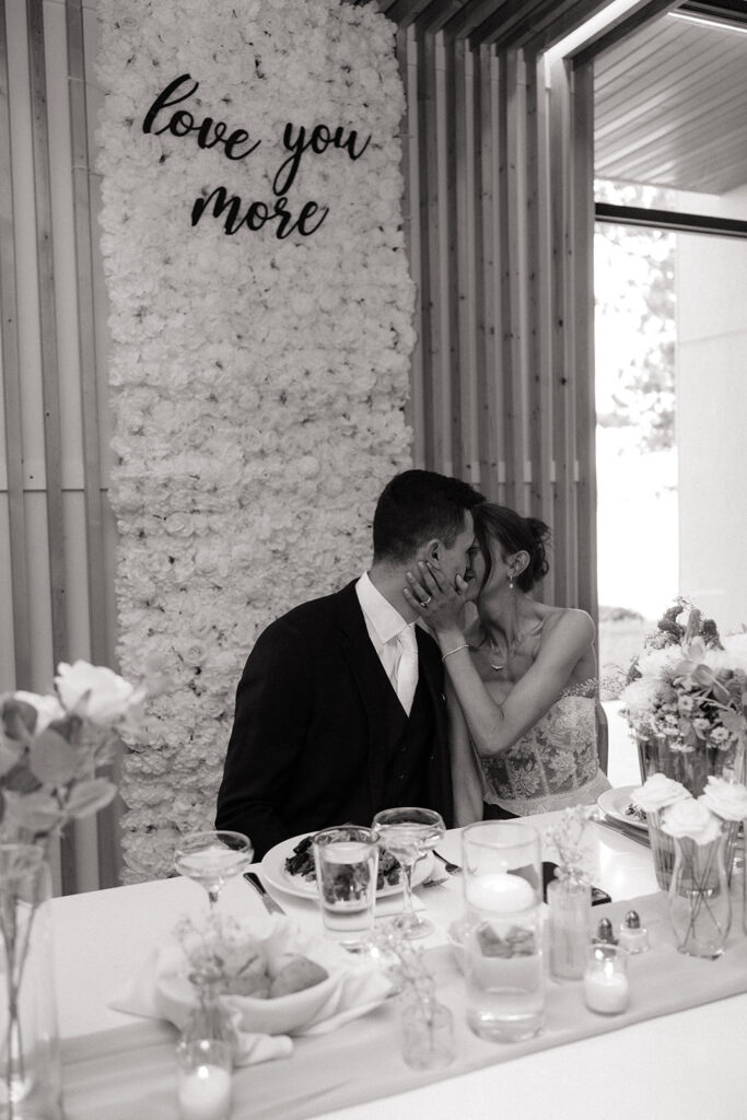 candid bride and groom reactions during wedding speeches