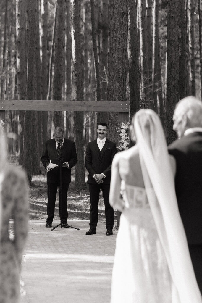 groom reaction to bride walking down the aisle