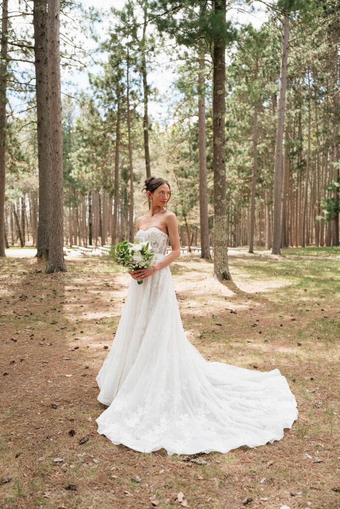 bride at the forest during their nature wedding at the catalyst by nature link