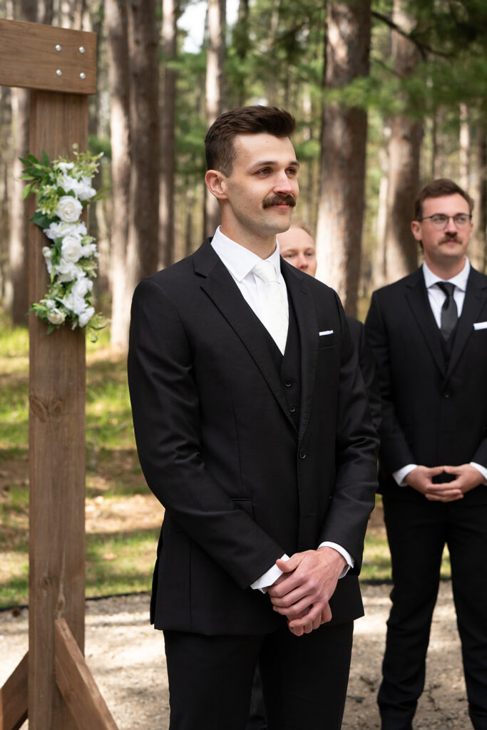 groom reaction to bride walking down the aisle