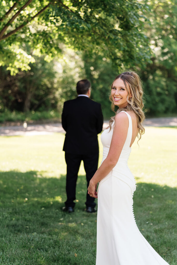 emotional bride and dad first look
