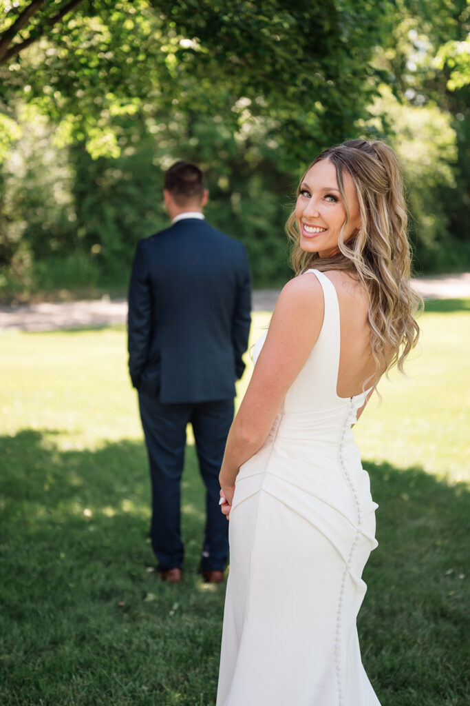 emotional bride and groom first look