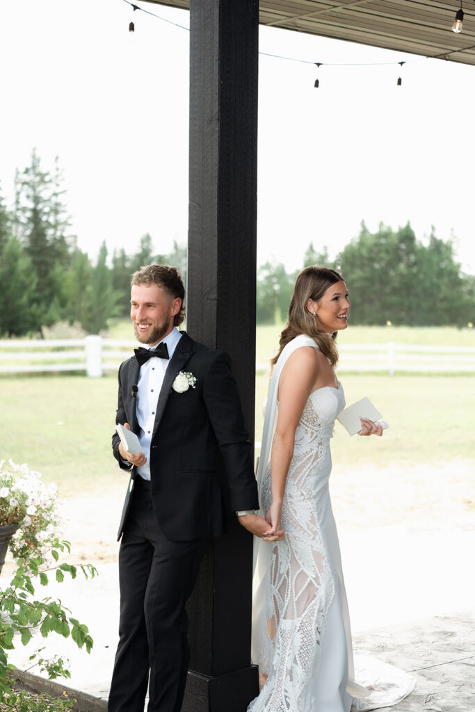bride and groom first touch and private vow exchange