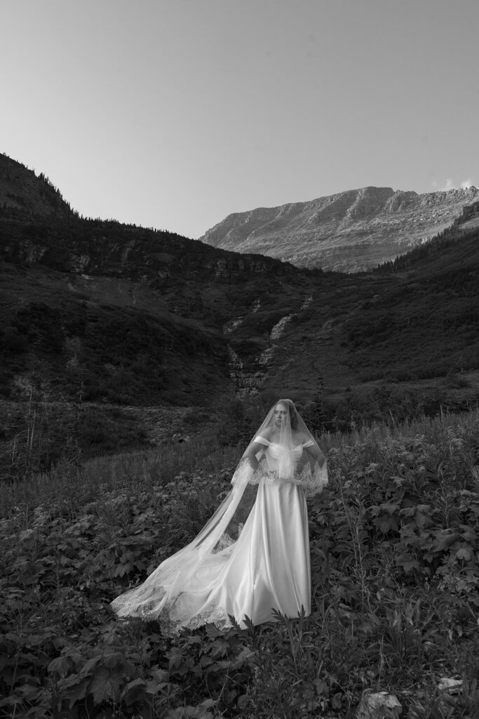 moody bridal portrait in the mountains at glacier national park