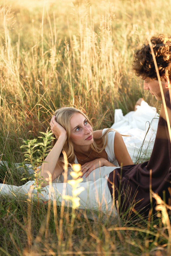 golden hour engagement photos in a field in bemidji mn
