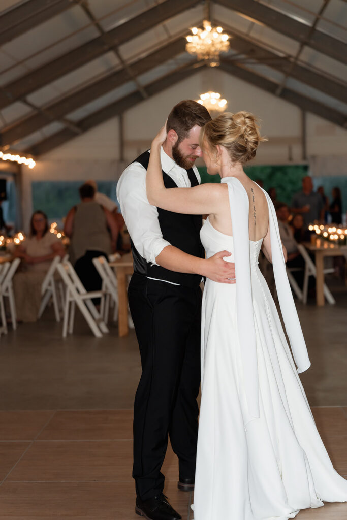 candid first dance moments during a wedding reception at northern oaks events